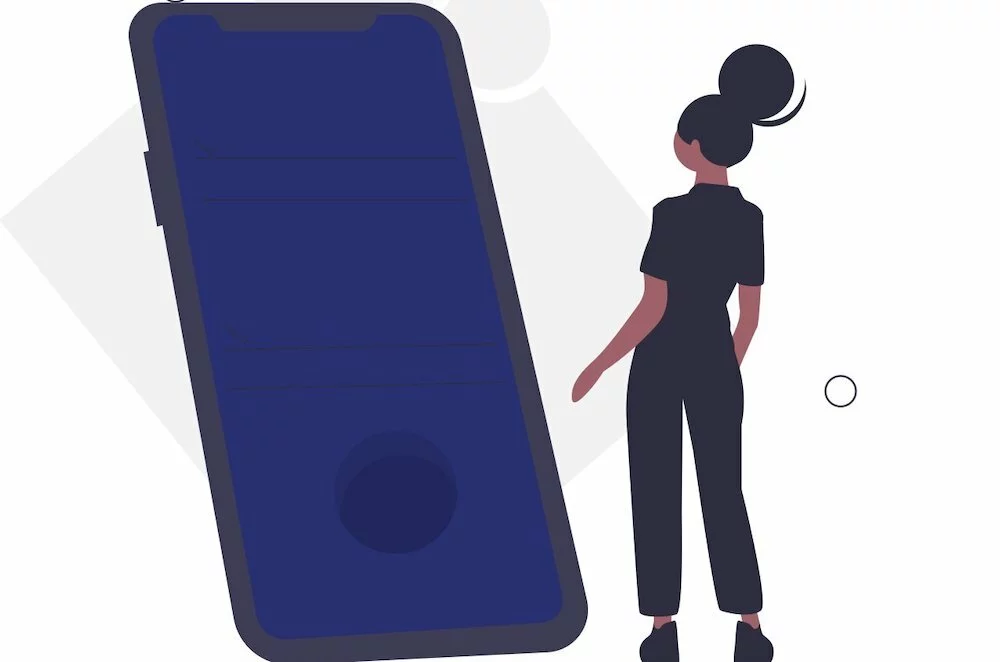 woman looking at mobile phone