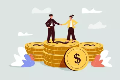 shaking hands on stacks of coins