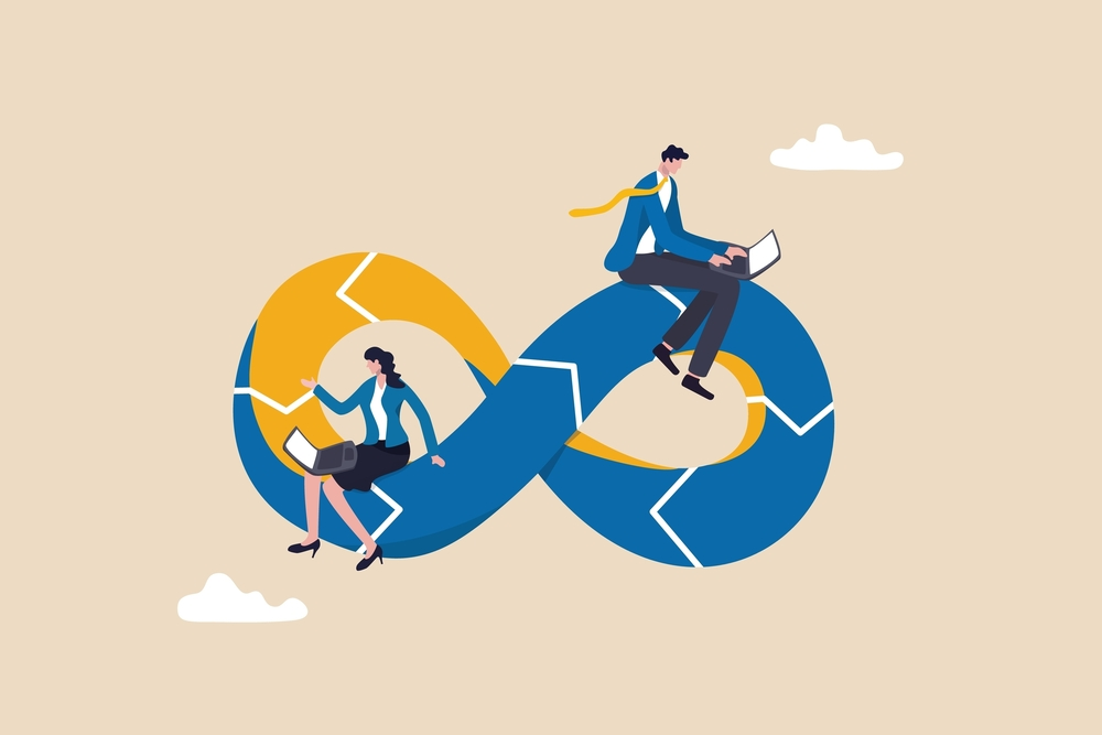 business people working on laptops sitting on infinity symbol with arrows showing continuous workflows