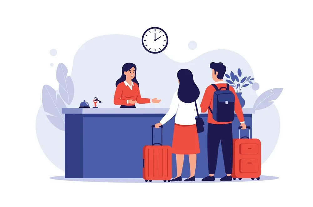 couple checking in at hotel desk
